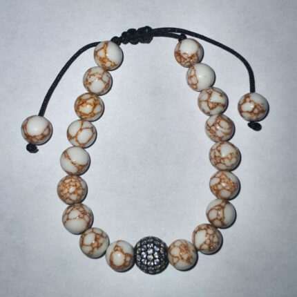 pulsera con dije bola con incrustaciones de zirconia